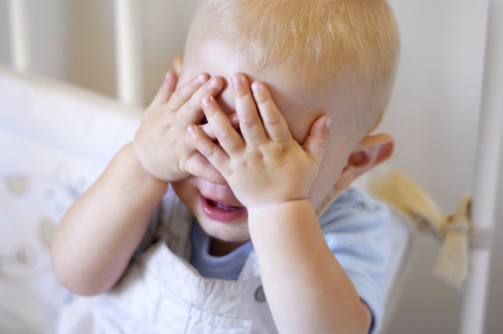 A baby's response to peek-a-boo could hold clues to autism